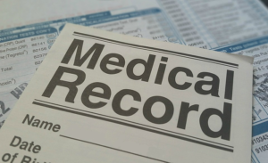 Papers with medical records written on them
