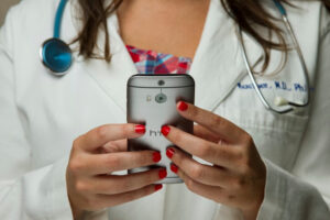 Doctor holding a smart phone